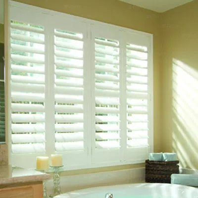 White plantation shutters in a Texas bathroom